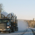 A heavy truck on Highway 11/17 in Northern Ontario, illustrating the safety challenges faced by truckers and road users.