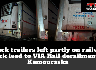 Truck trailers left partly on railway track lead to VIA Rail derailment in Kamouraska Nighttime photo montage of two truck trailers, one branded HGC Harman Group and the other Ameri-Can Systems, parked in a snowy yard near a railway line. The headline on the graphic reads: “Truck trailers left partly on railway track lead to VIA Rail derailment in Kamouraska,” with the TruckStopCanada.com logo in the upper right corner.